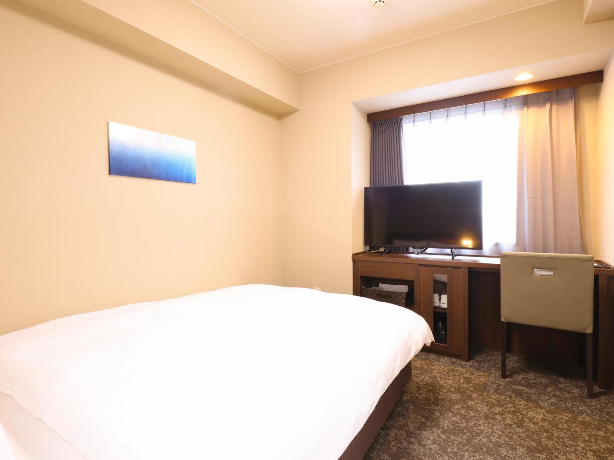 Tennen Onsen Taho-no-Yu Dormy Inn Niigata Zimmer foto
